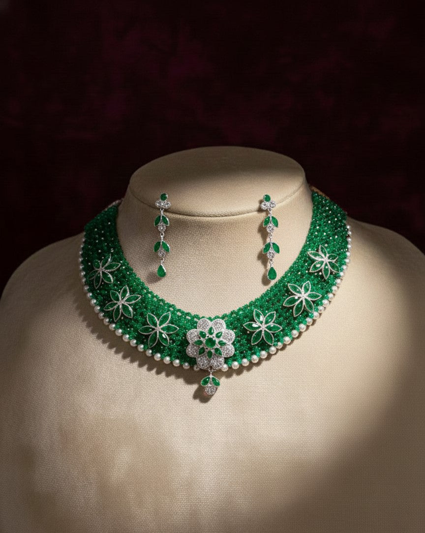 Strand Emerald and Diamond Floral Choker Necklace with Pearl Accents.