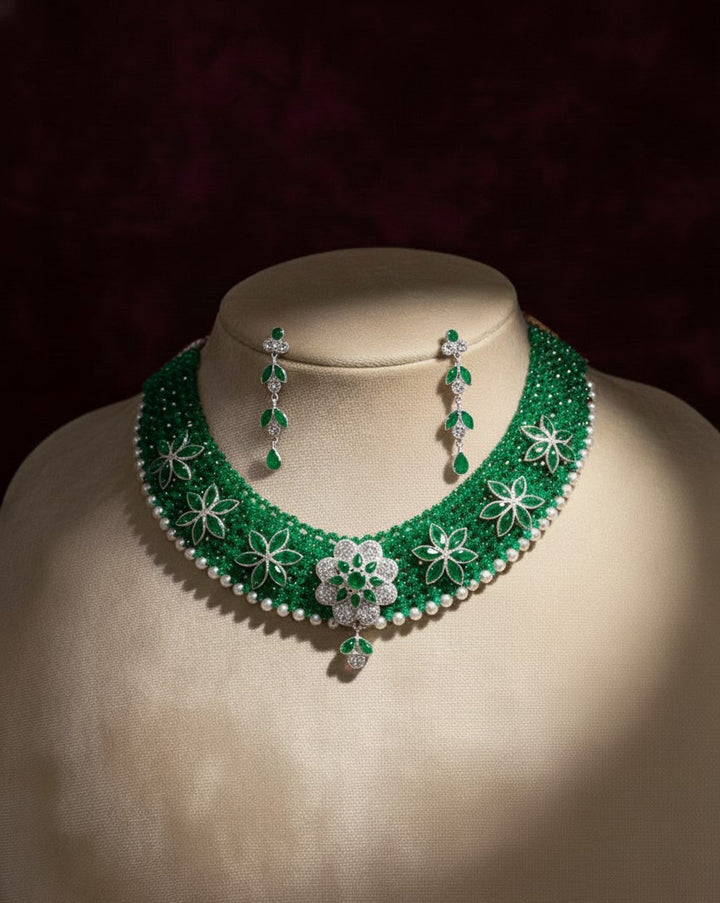 Strand Emerald and Diamond Floral Choker Necklace with Pearl Accents.