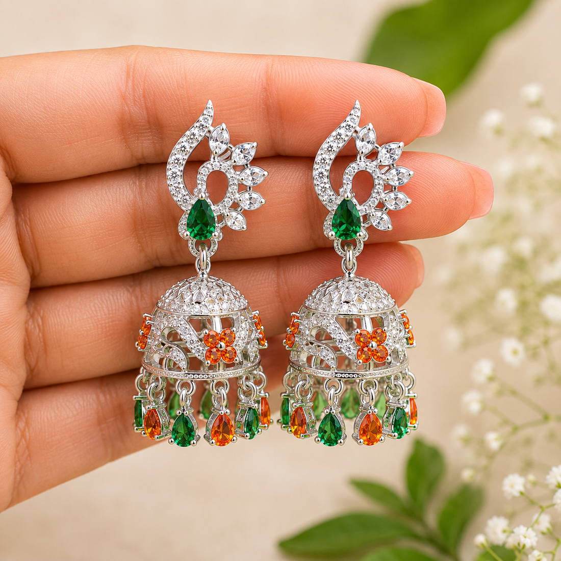 Designer Silver Jhumka Earrings with Emerald Green & Orange Stones