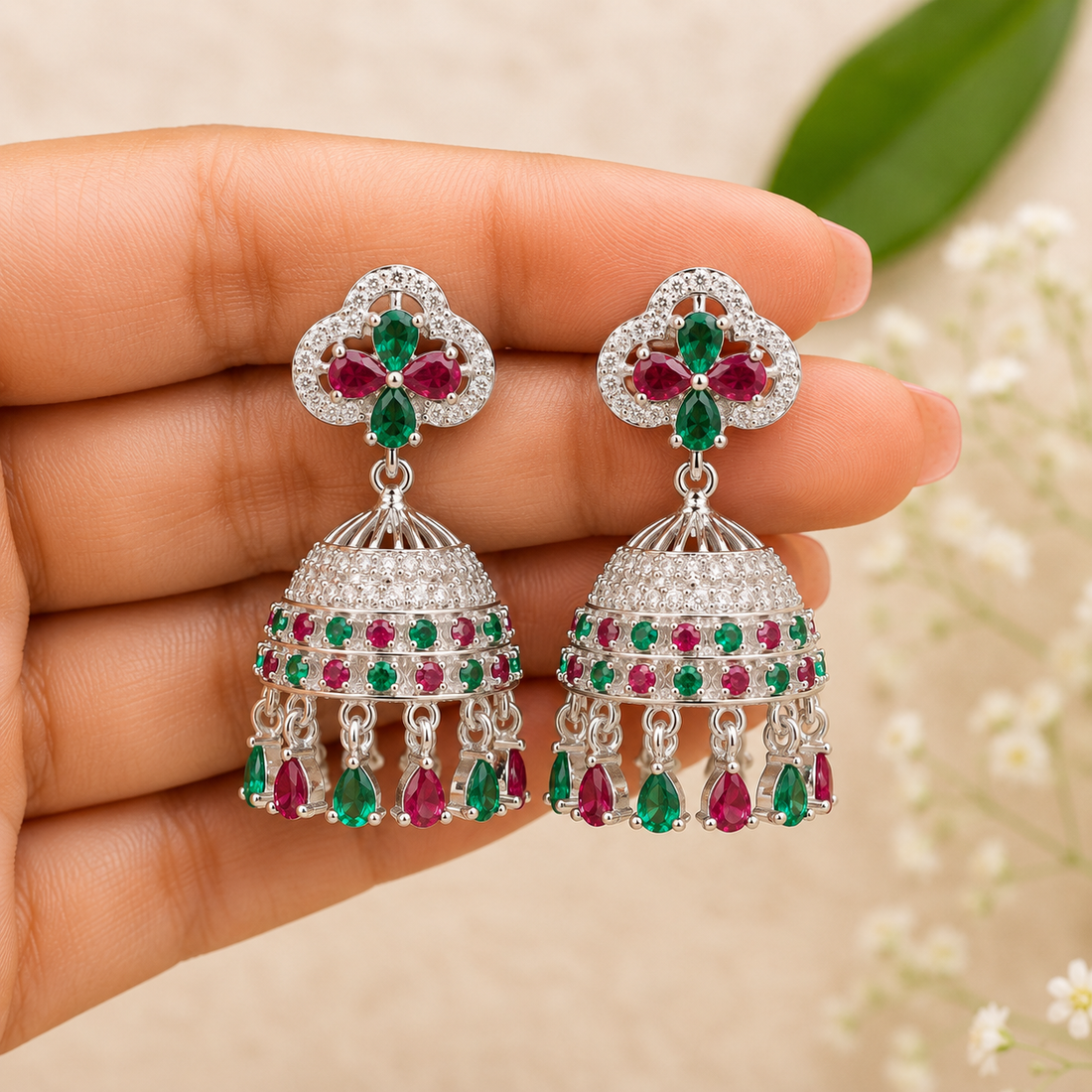 Elegant Silver Jhumka Earrings with Ruby & Emerald Stone Design
