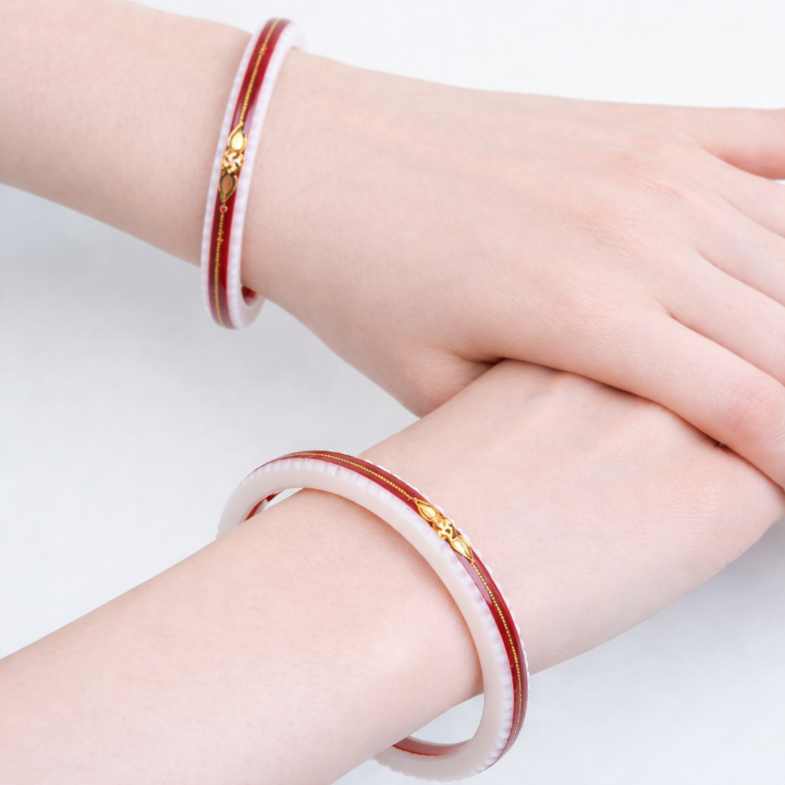 Elegant White and Maroon Gold-Plated Bangles