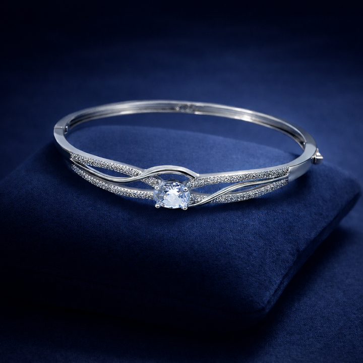 Elegant Silver Infinity Knot Solitaire Bangle