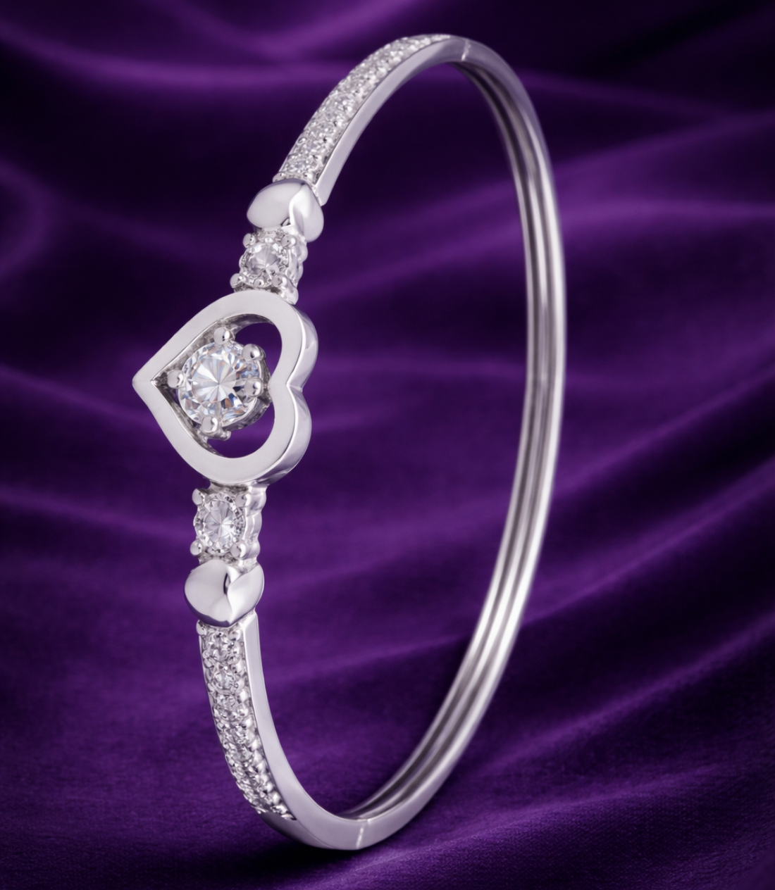 Elegant Silver Heart Bangle with Sparkling Gemstones