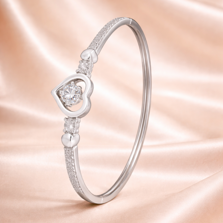 Elegant Silver Heart Bangle with Sparkling Gemstones