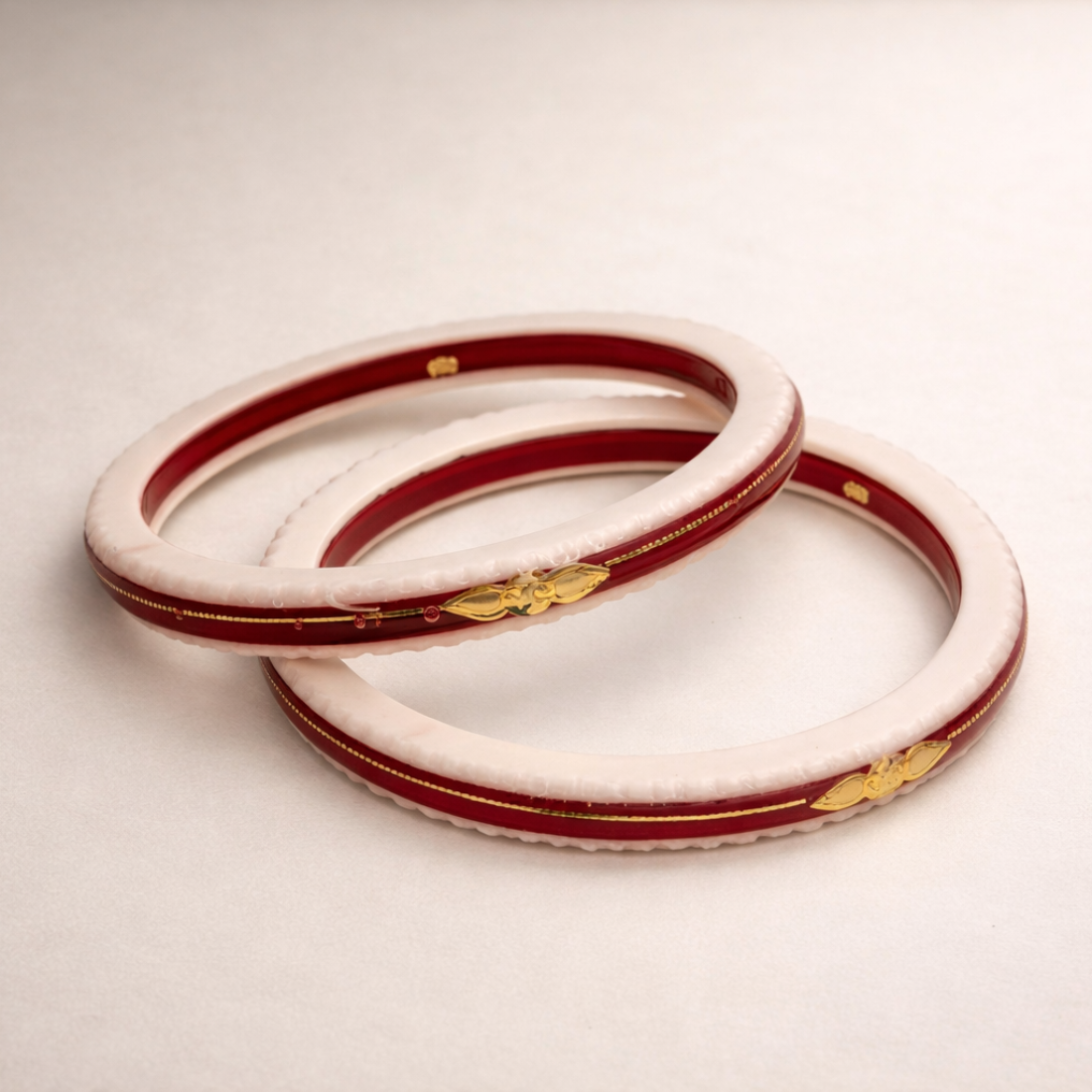 Elegant White and Maroon Gold-Plated Bangles