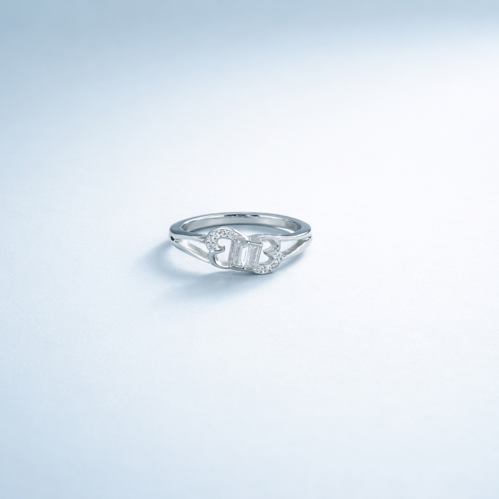 Elegant Silver Heart-Shaped Infinity Ring with Baguette-Cut Centerpiece