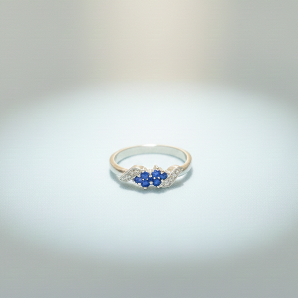 Elegant Three-Stone Blue Gemstone Ring with Diamond Accents - Balaji Jewellers
