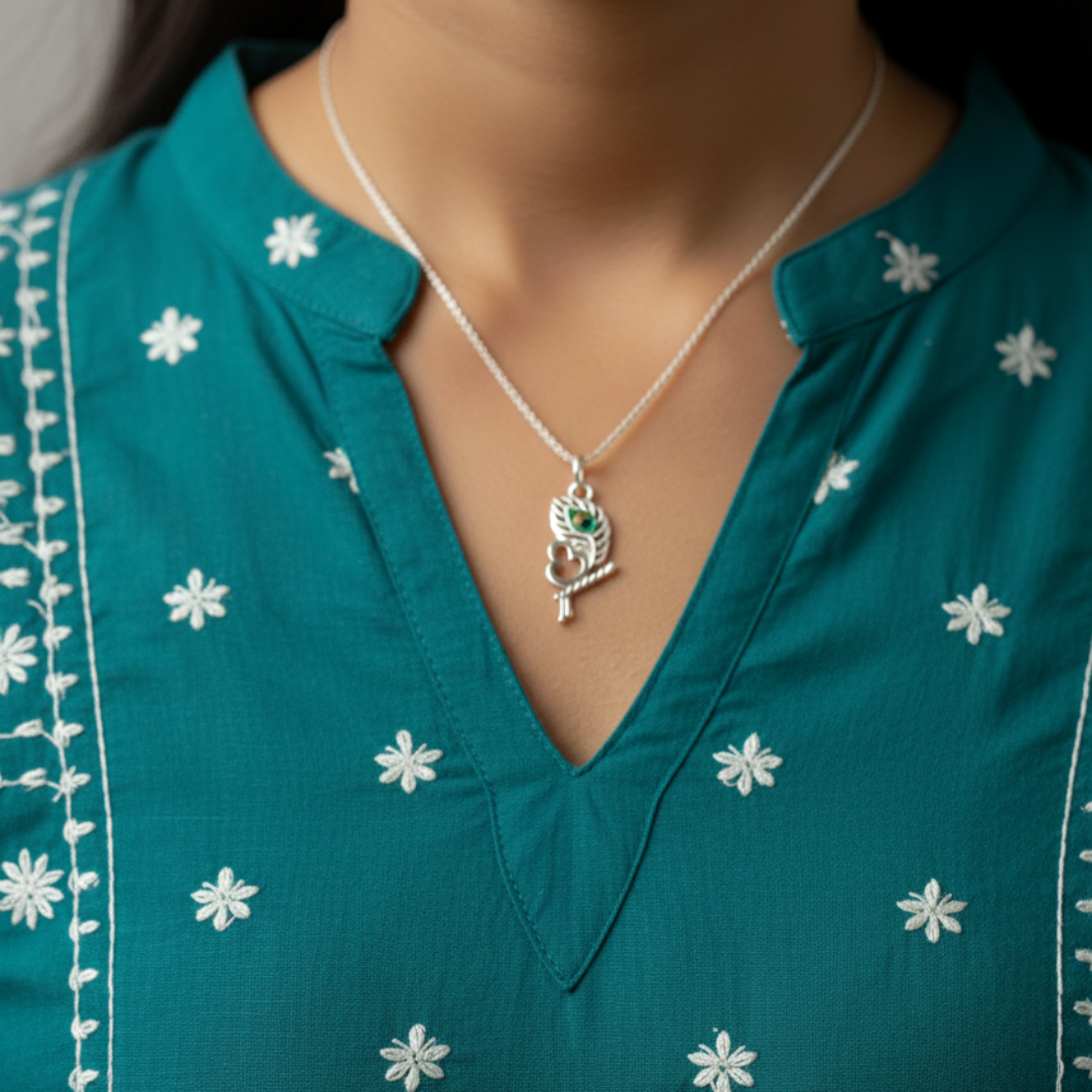 Elegant Sterling Silver Stylized Leaf Pendant with Om and flute