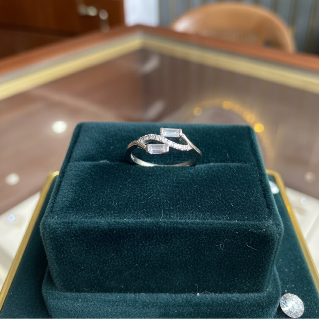 Geometric Baguette and Round-Cut Diamond Ring