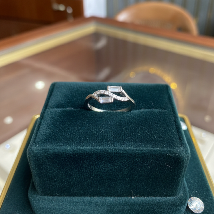 Geometric Baguette and Round-Cut Diamond Ring