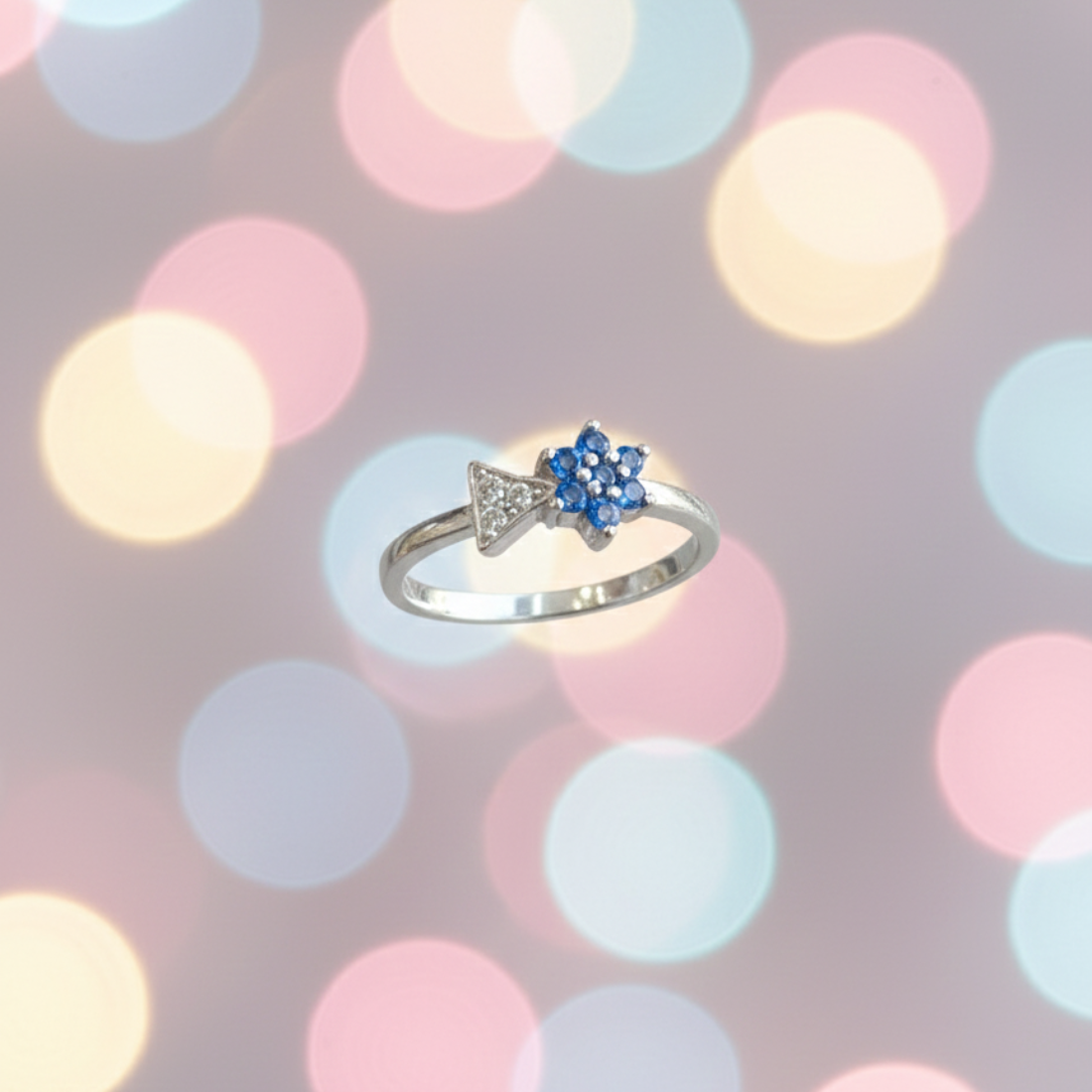 Blue Flower and Clear Triangle Accent Silver Ring.