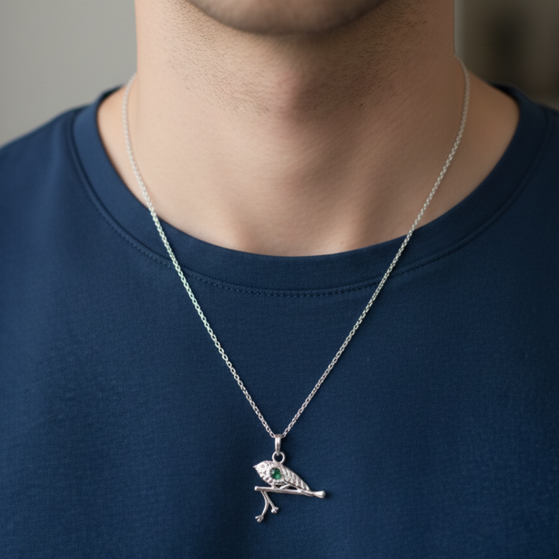 Symbolic Silver Flute and Peacock Feather Pendant.