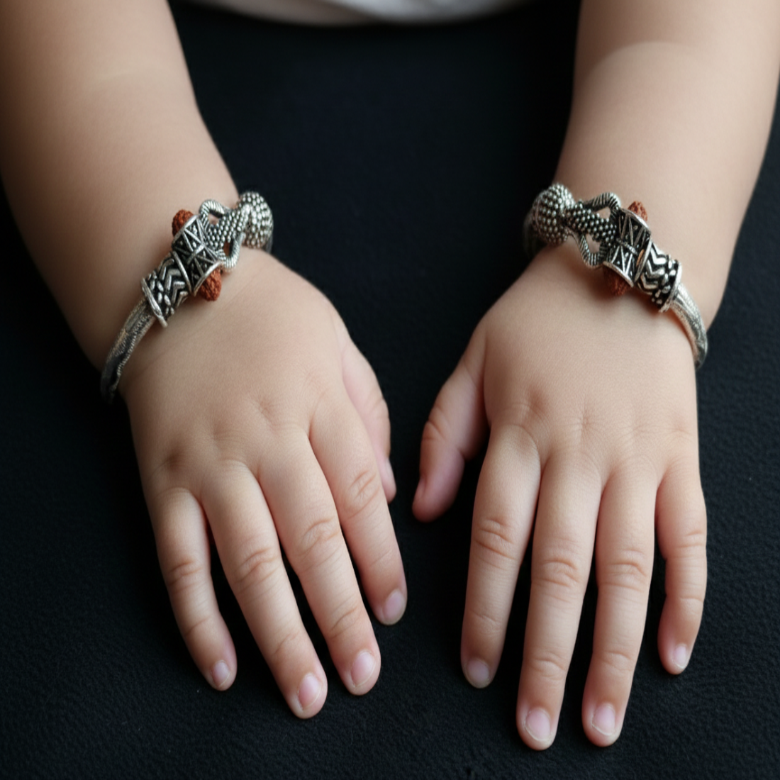 Divine Protection Silver Adjustable Baby Kada with Rudraksha & Trishul Motifs.