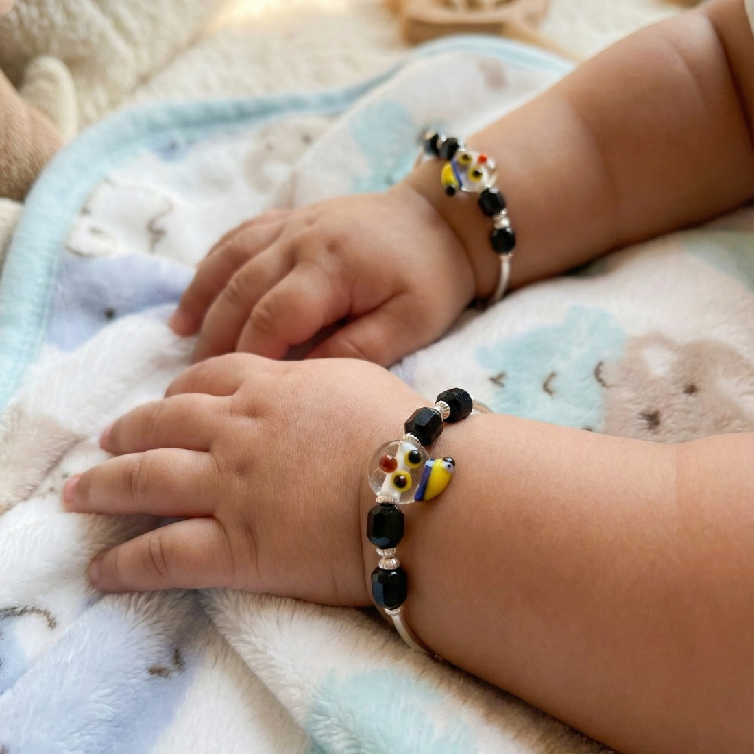Adjustable Sterling Silver Baby Kada with Whimsical Glass and Black Agate Beads.