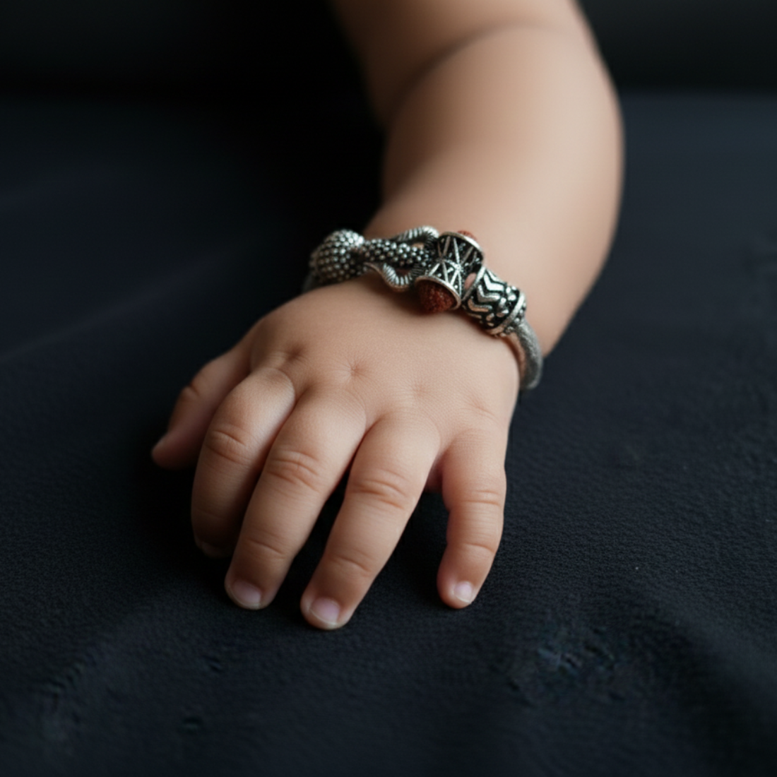 Divine Protection Silver Adjustable Baby Kada with Rudraksha & Trishul Motifs.