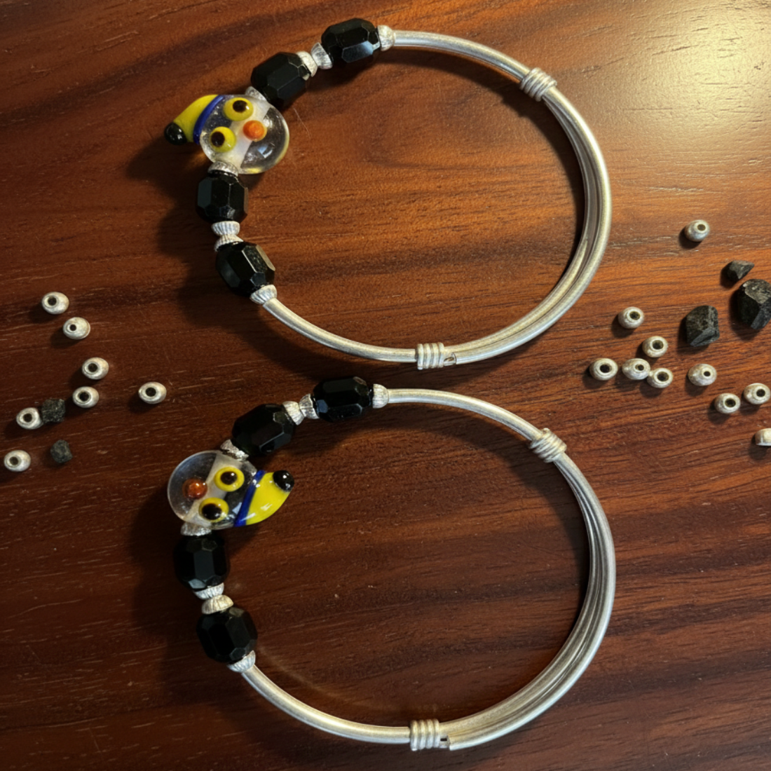 Adjustable Sterling Silver Baby Kada with Whimsical Glass and Black Agate Beads.