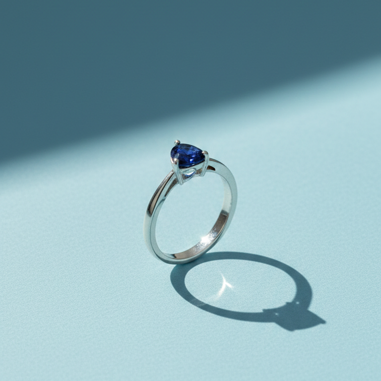 Elegant Silver Heart-Shaped Deep Blue Sapphire Solitaire Ring