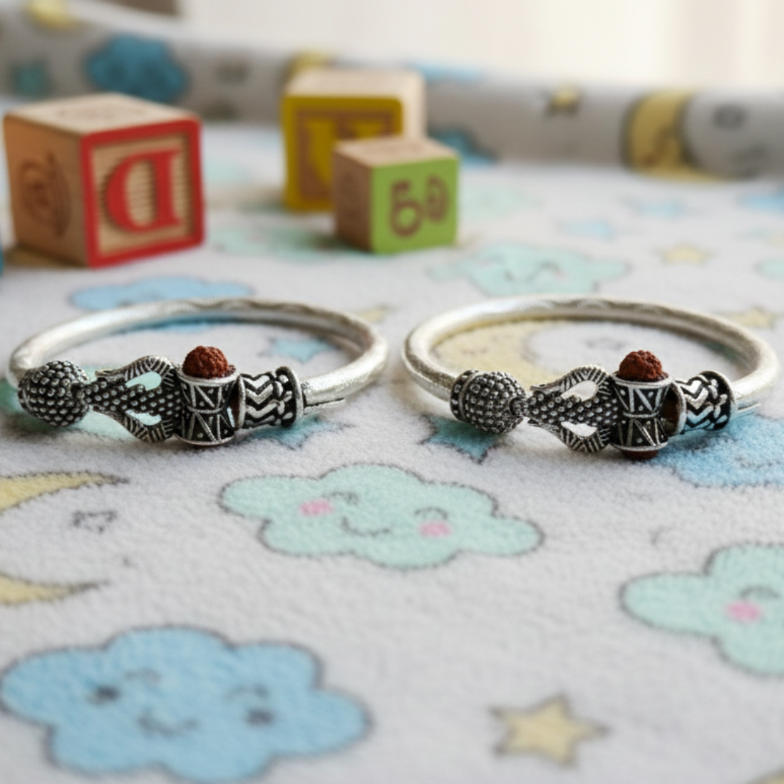 Divine Protection Silver Adjustable Baby Kada with Rudraksha & Trishul Motifs.