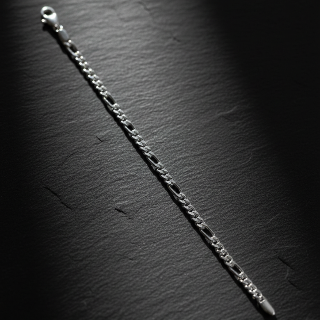 Classic Silver-Toned Figaro Chain Bracelet for Men.