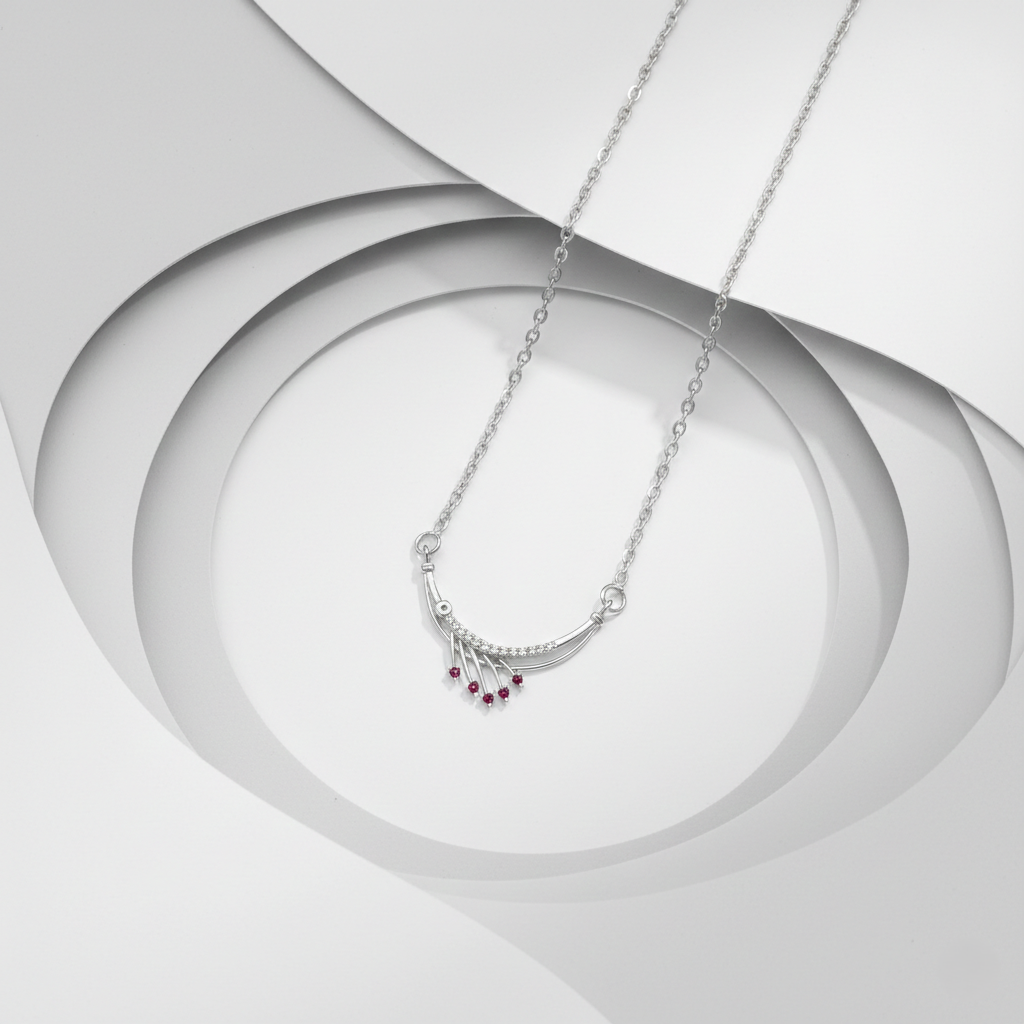 Timeless Elegance: Silver Finish Ruby-Toned Arc Pendant Necklace