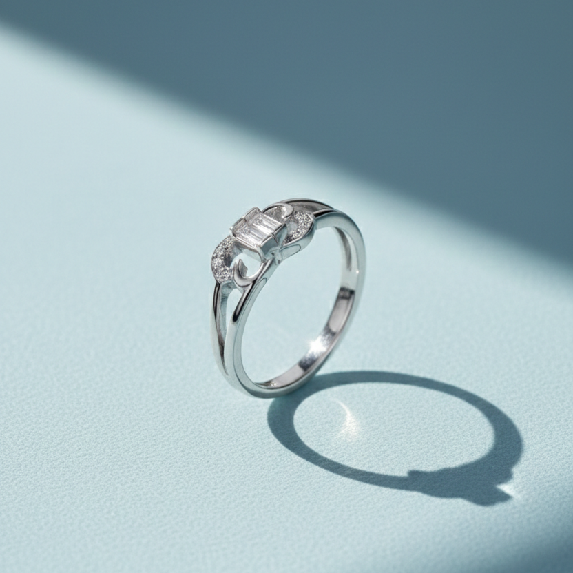 Elegant Silver Heart-Shaped Infinity Ring with Baguette-Cut Centerpiece