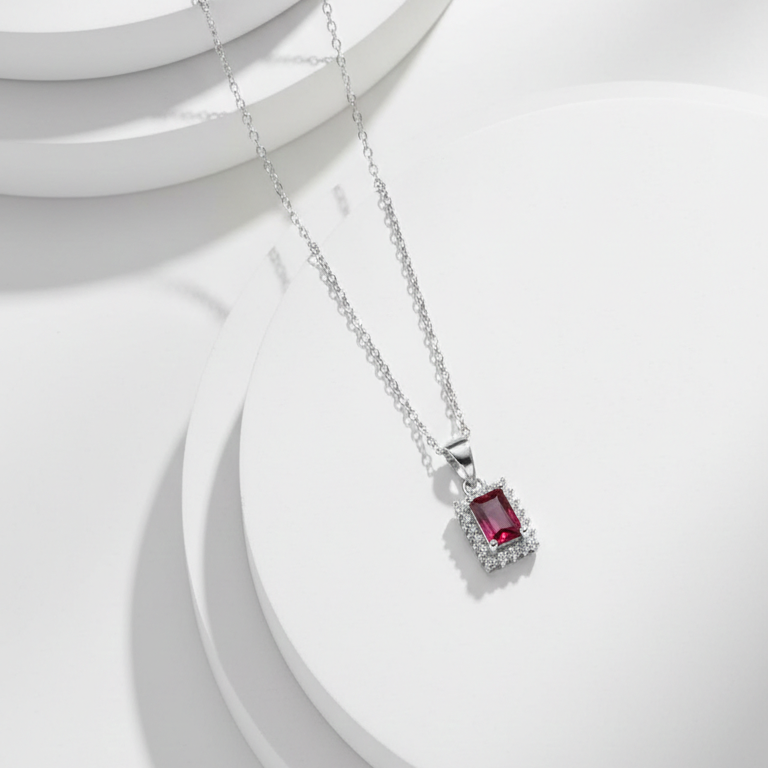 Emerald-Cut Crimson Ruby Halo Pendant in Sterling Silver