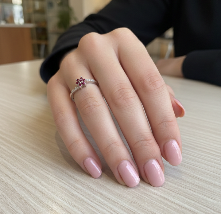 Delicate Silver Ring with Ruby-Colored Floral Cluster and Diamond Accents