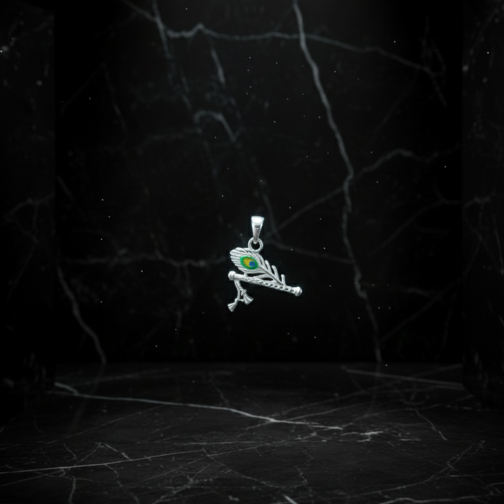 Symbolic Silver Flute and Peacock Feather Pendant.
