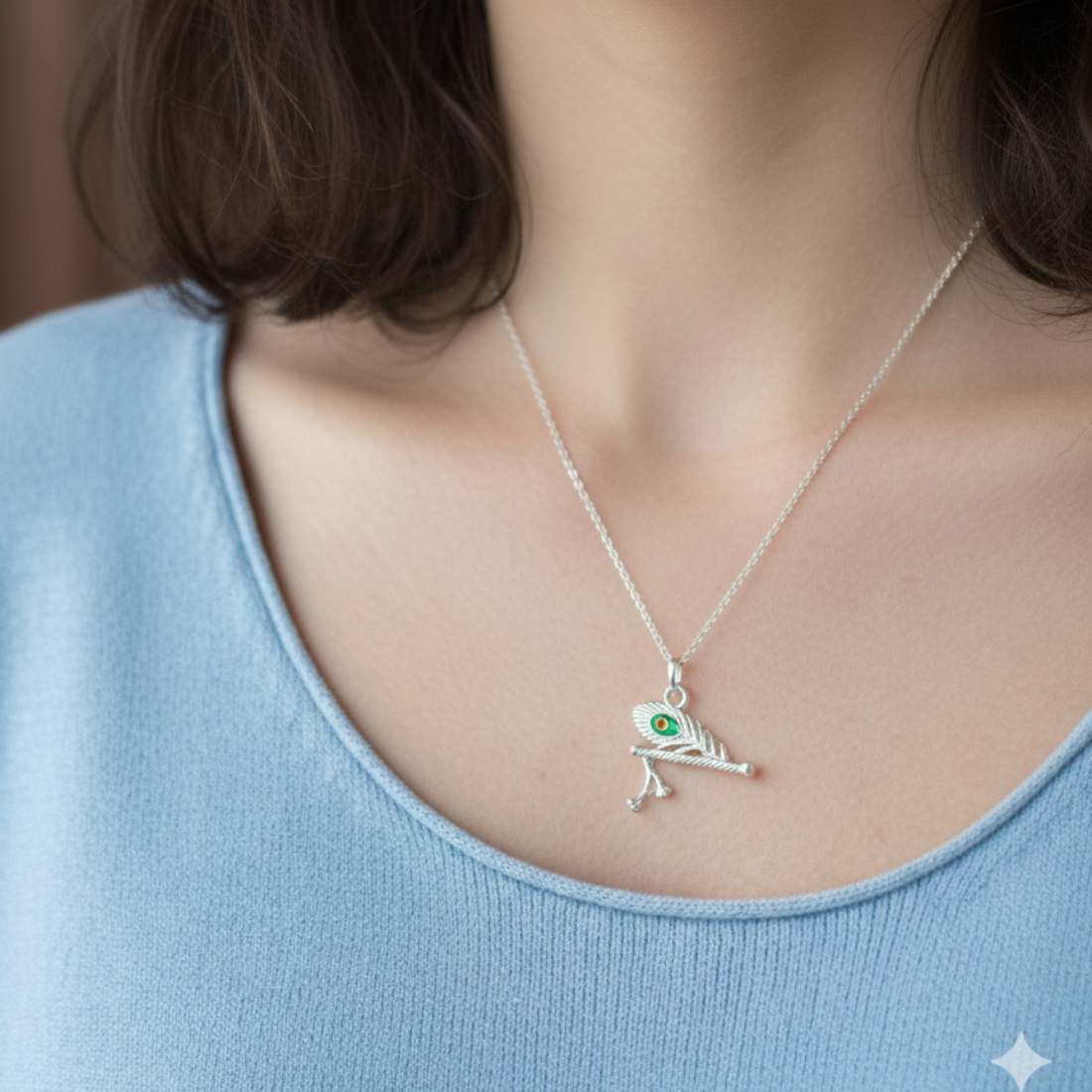 Symbolic Silver Flute and Peacock Feather Pendant.
