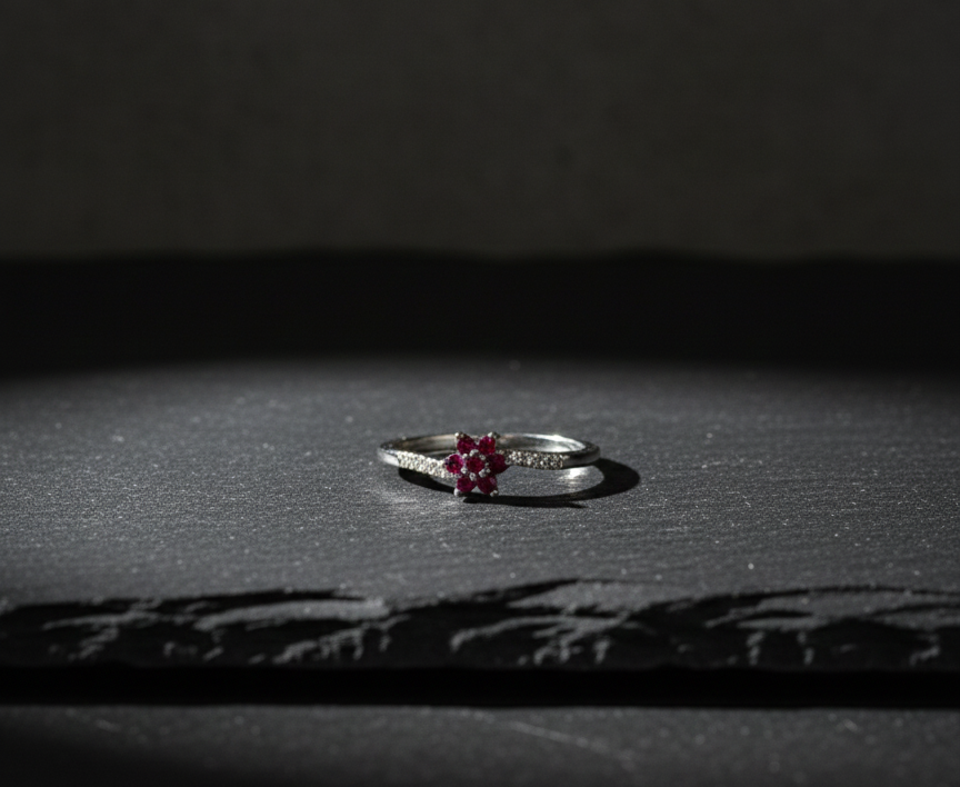 Delicate Silver Ring with Ruby-Colored Floral Cluster and Diamond Accents