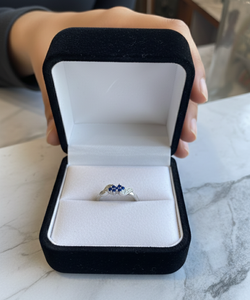 Elegant Three-Stone Blue Gemstone Ring with Diamond Accents