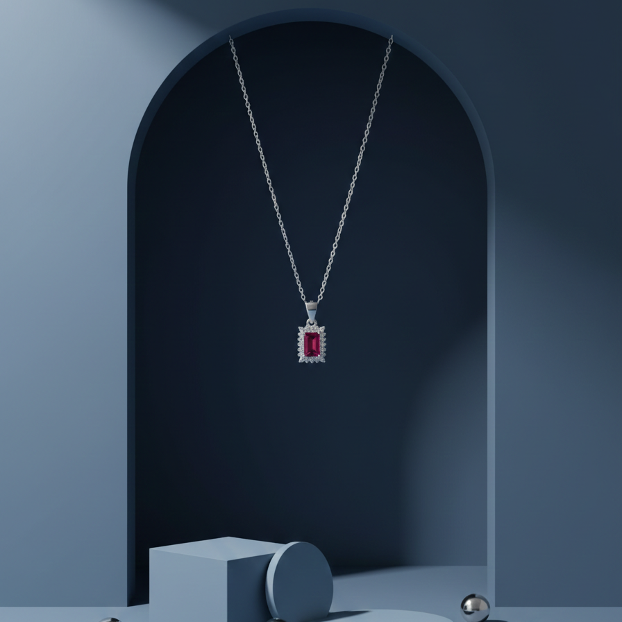 Emerald-Cut Crimson Ruby Halo Pendant in Sterling Silver