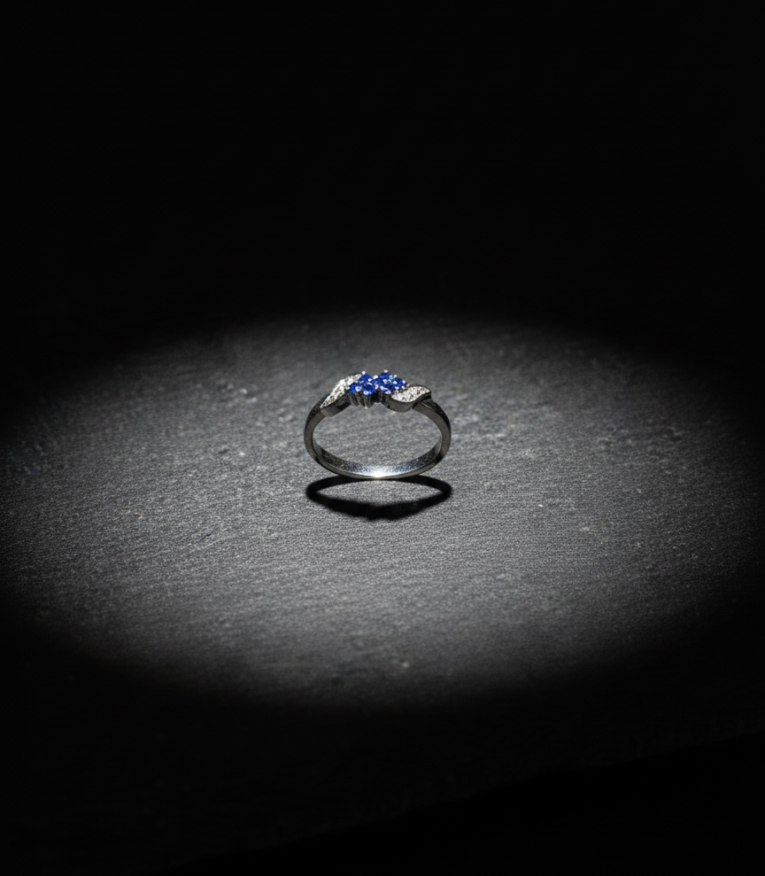 Elegant Three-Stone Blue Gemstone Ring with Diamond Accents