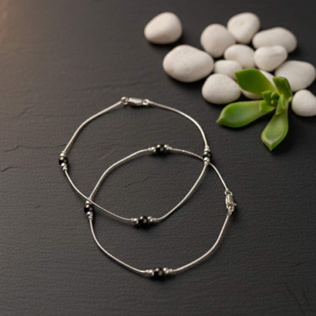 Elegant Silver Anklets with Dark Beading.