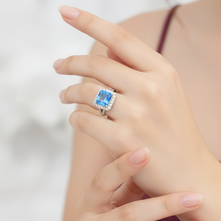 Elegant Radiant-Cut Blue Topaz Halo Ring in Sterling Silver