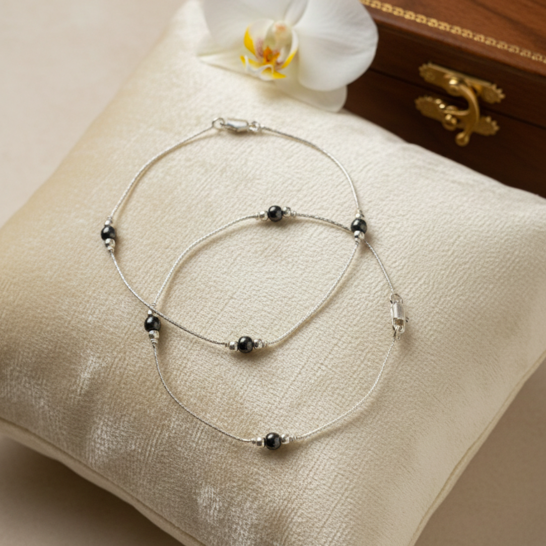 Elegant Silver Anklets with Dark Beading.