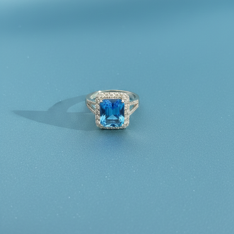 Elegant Radiant-Cut Blue Topaz Halo Ring in Sterling Silver