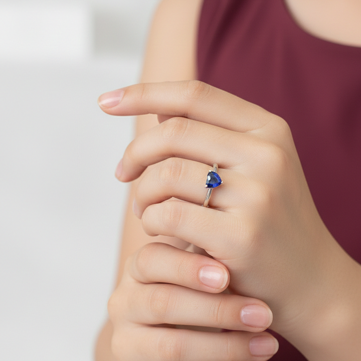Elegant Silver Heart-Shaped Deep Blue Sapphire Solitaire Ring