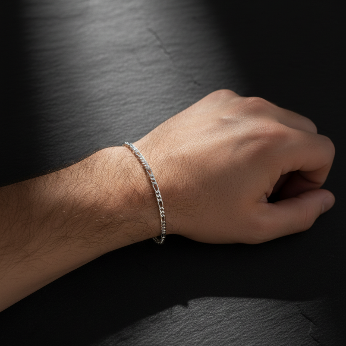 Classic Silver-Toned Figaro Chain Bracelet for Men.